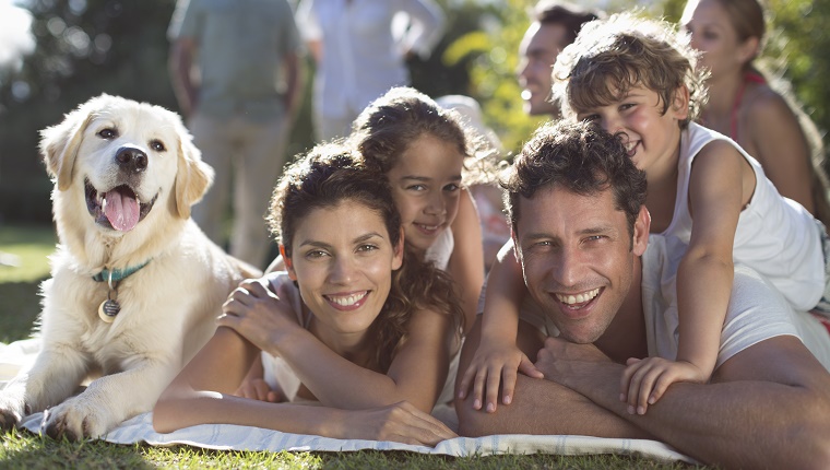 Family relaxing in backyard