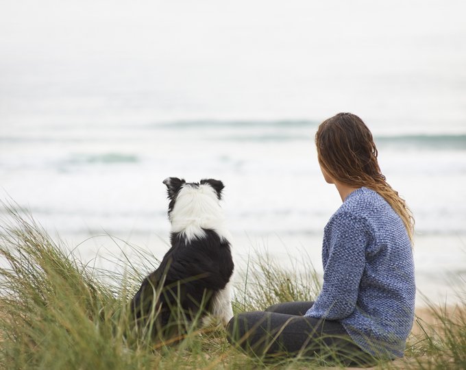 Sitting in the sand dunes watching the sea.