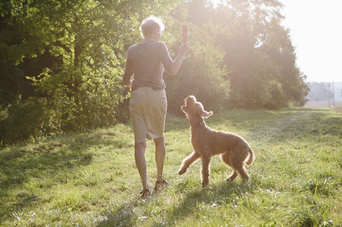 woman walking with her dog