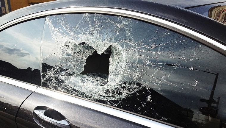 Smashed car window from recent theft in Brooklyn.