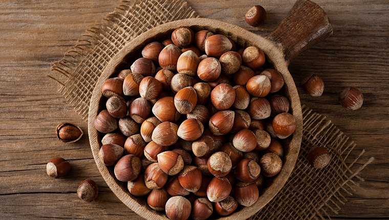 Hazelnuts in an wooden bowl