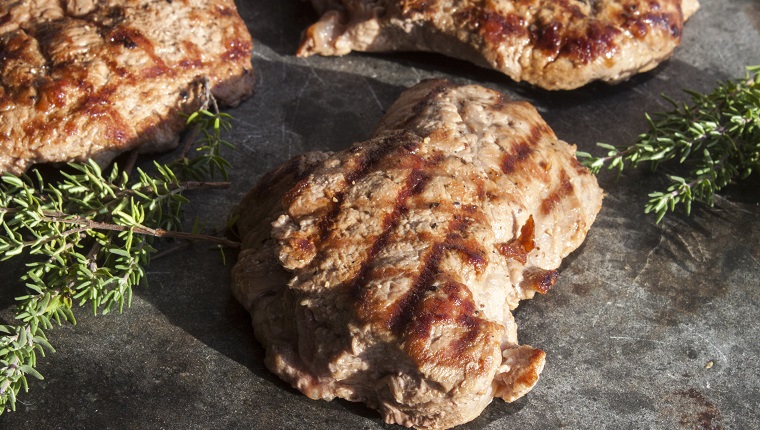 Moose meat and thyme, on a stone plate