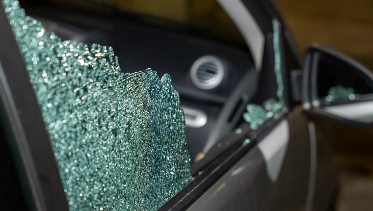 Broken passenger window, car theft in the underground parking.