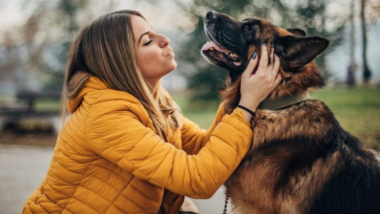 woman and dog reunited