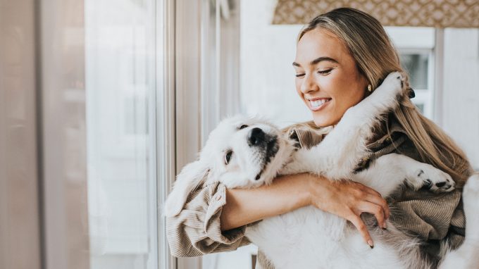 Golden Retriever puppy with a dog mom