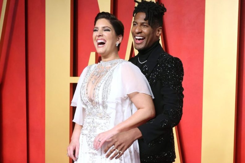 Jon Batiste with wife at Vanity Fair Oscar Party, the couple recently adopted a rescue dog.