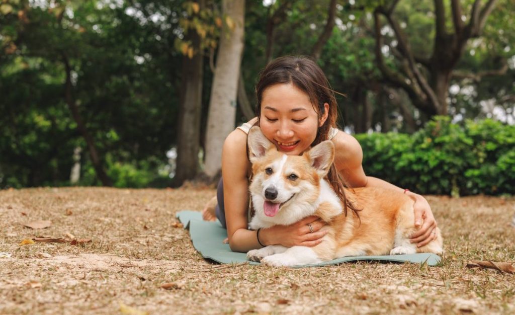 Woman and a Corgi