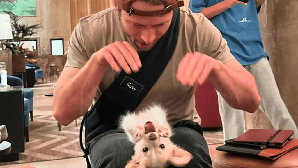 Glen Powell with his dog Brisket