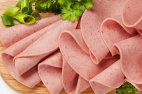A closeup shot of bologna cold cuts, which can be safe for dogs in moderation.