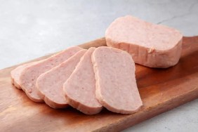 A closeup photo of sliced Spam, which is not safe for dogs to eat.